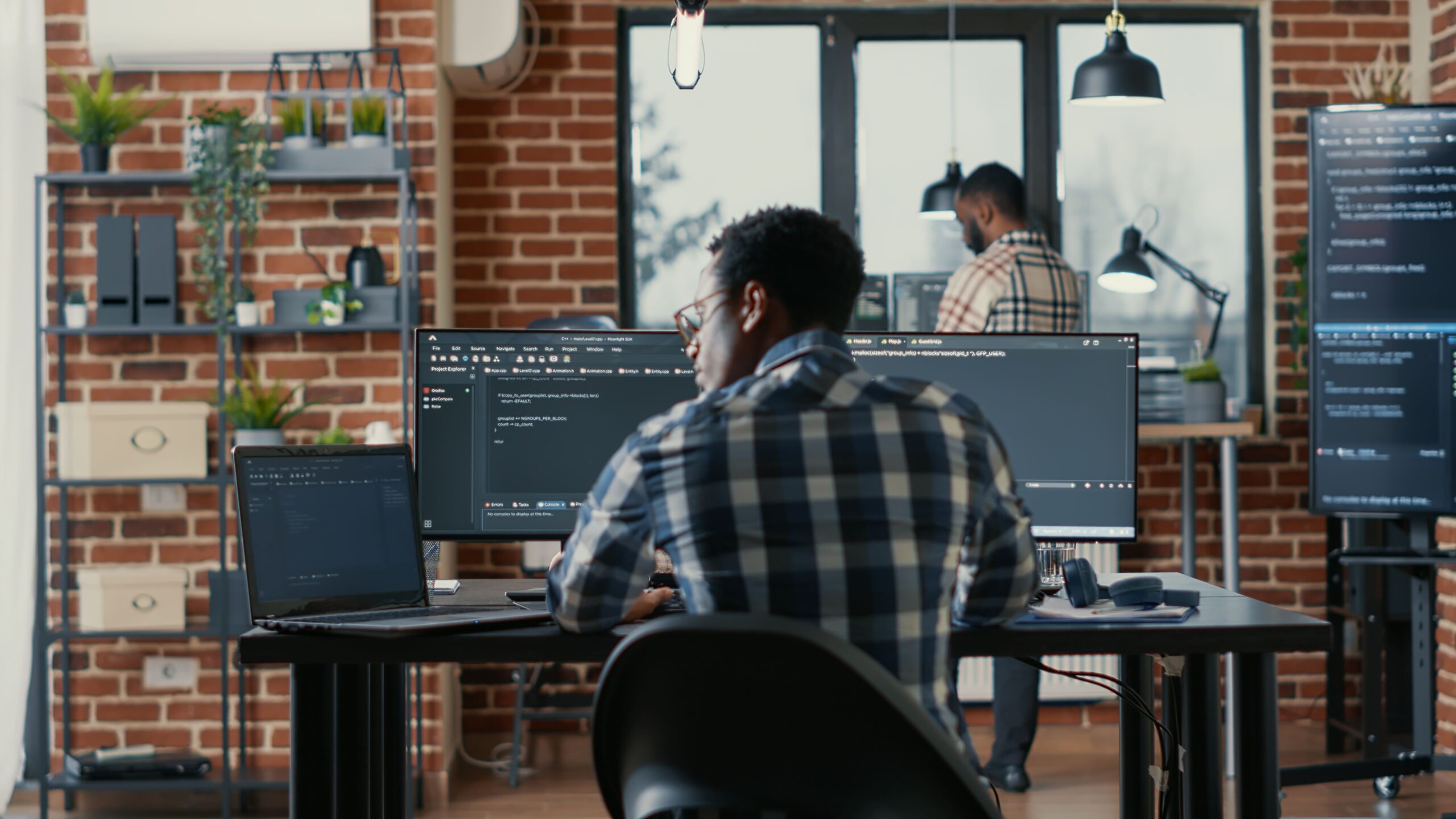 programer-coding-laptop-sitting-down-desk-with-computer-screens-parsing-code-software-agency-software-developer-compiling-algorithms-with-cloud-programers-working-background